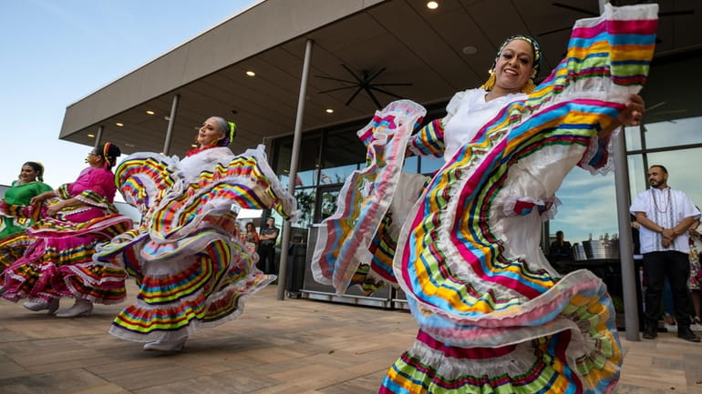 Folklorico dancers from the group Viva Mexico perform their routine...