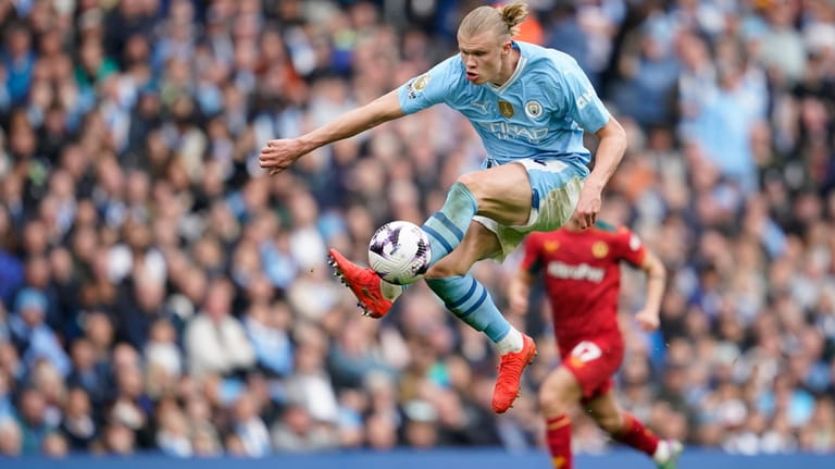Manchester City's Erling Haaland is in action during the English...