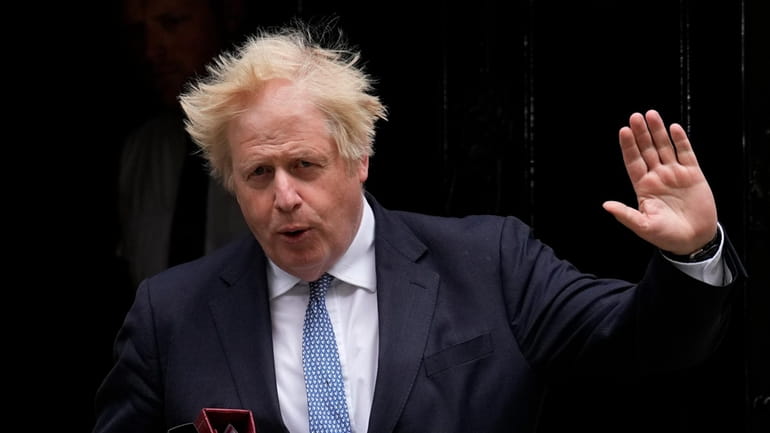 British Prime Minister Boris Johnson leaves 10 Downing Street to...
