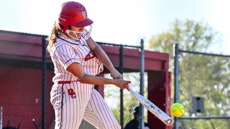 Isabella Damiano of Glen Cove knocks one to the outfield...
