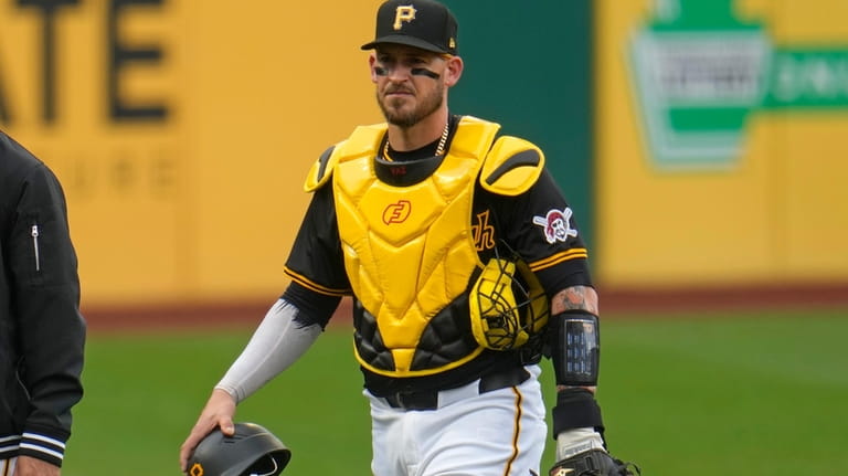 Pittsburgh Pirates catcher Yasmani Grandal walks from the bullpen after...