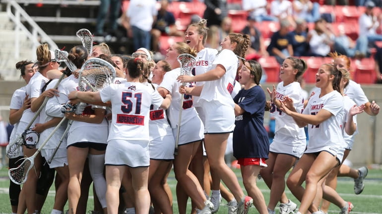 Stony Brook celebrates its win in the CAA women’s lacrosse...